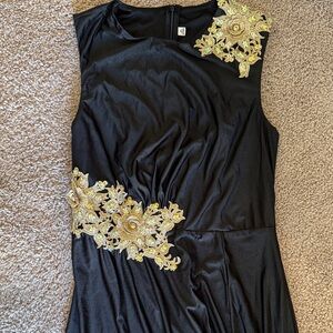 Elegant Black Dress with Gold Embellishments